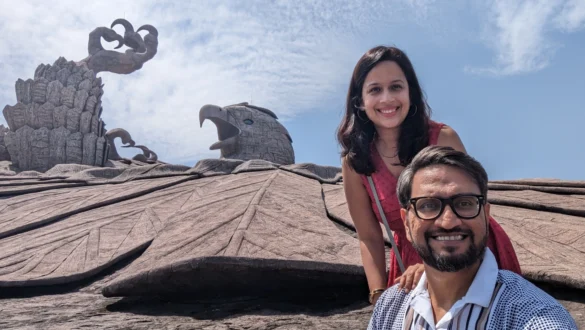 A couple with backdrop of Jatayu Sculpture in Kerala