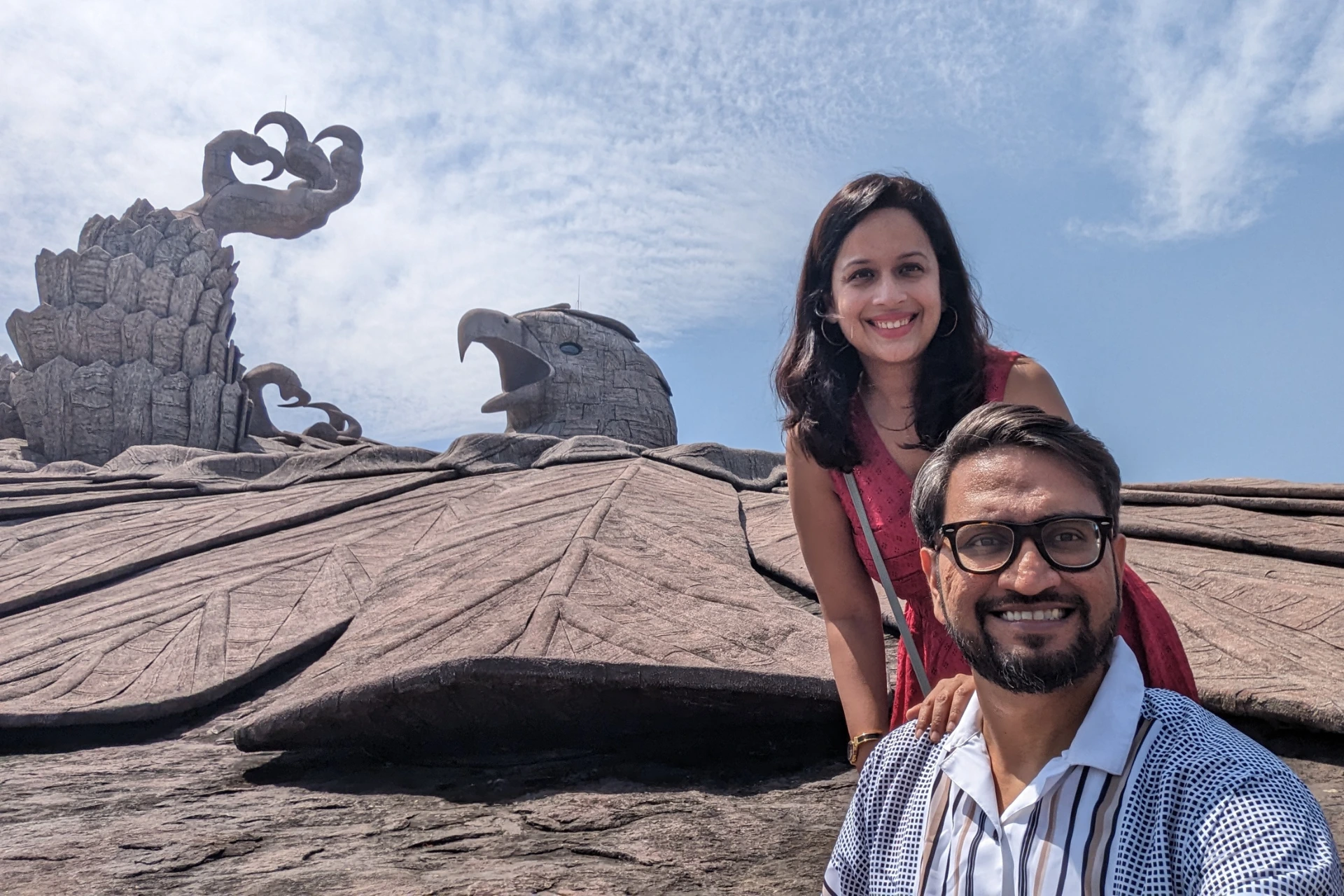 A couple with backdrop of Jatayu Sculpture in Kerala